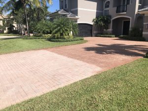 Staining pavers virtually amounts to painting pavers. The look is un-natural, the surface can be slippery, and if you've ever seen painted sidewalks - the paint/stain doesn't last.
